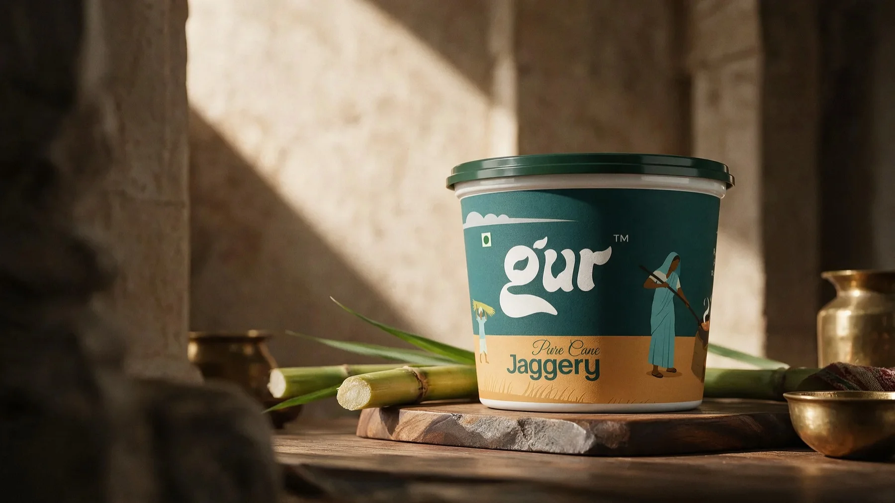 GUR tub with cut sugarcane in a traditional kitchen