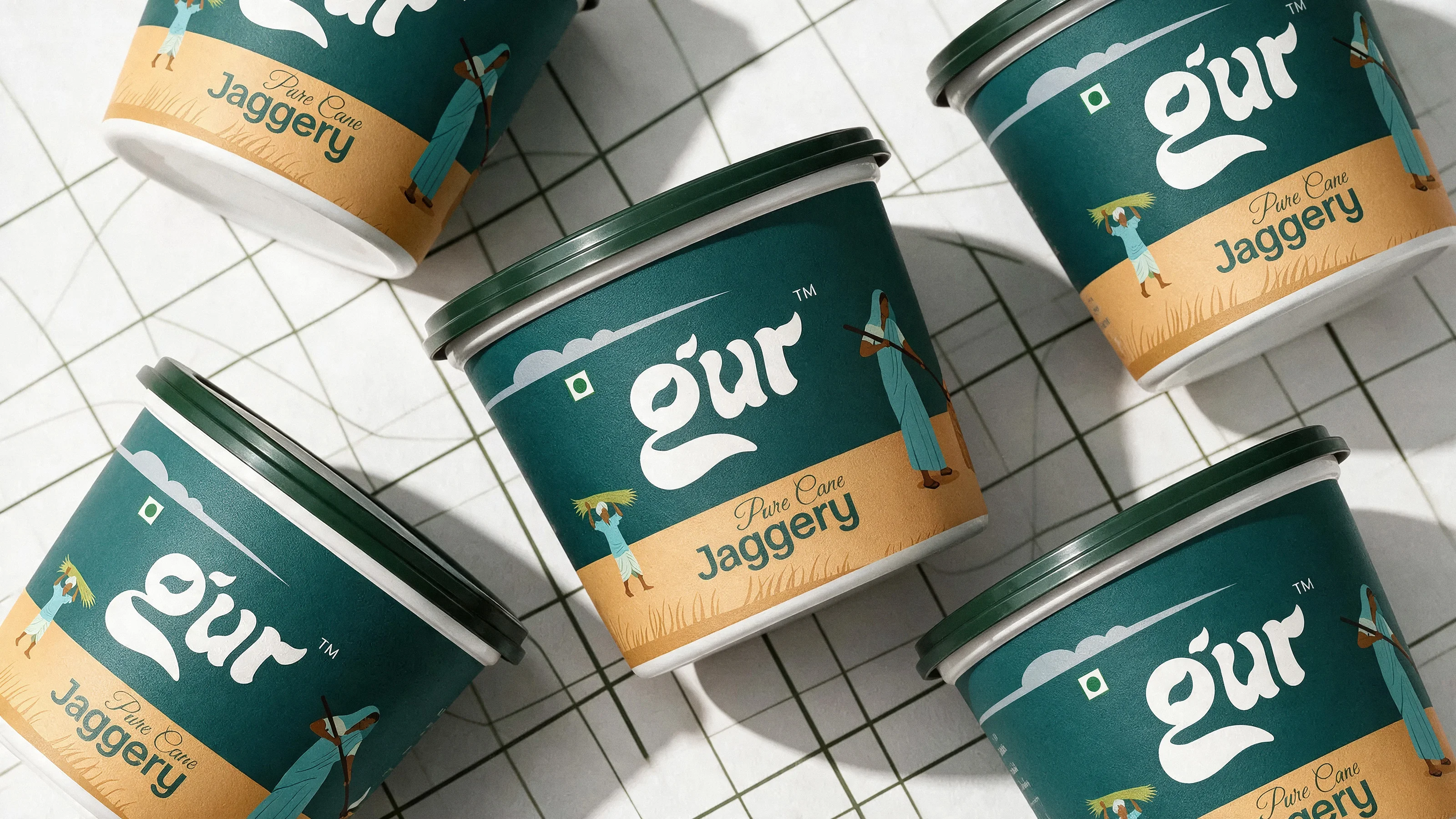 GUR tubs scattered across a tiled surface