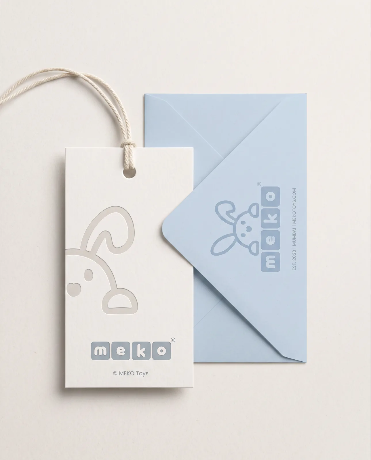 MEKO hang tag and printed envelope